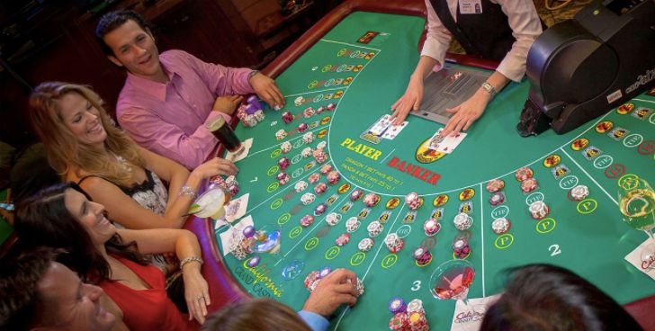 Group of people playing baccarat